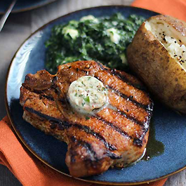 Dry Rubbed Porterhouse Pork Chops with Steakhouse Butter